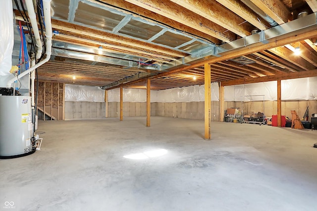 basement featuring gas water heater