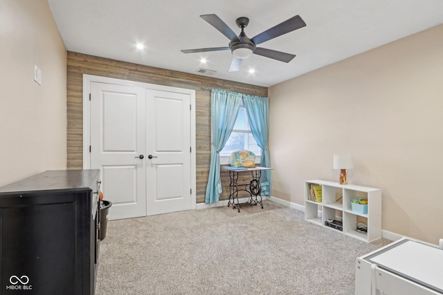 playroom featuring carpet flooring and ceiling fan