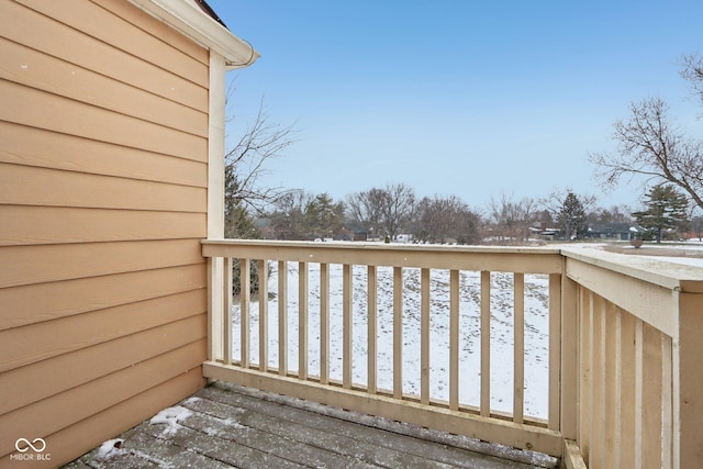 view of snow covered deck