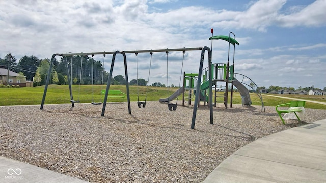 view of jungle gym with a lawn