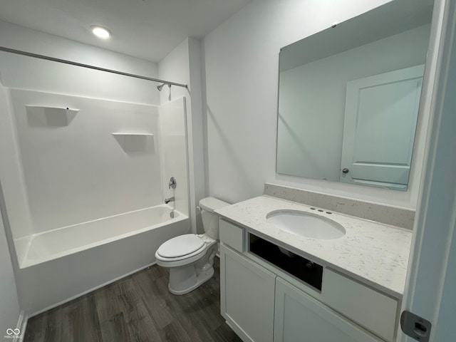 full bathroom featuring vanity, wood-type flooring, toilet, and shower / bath combination