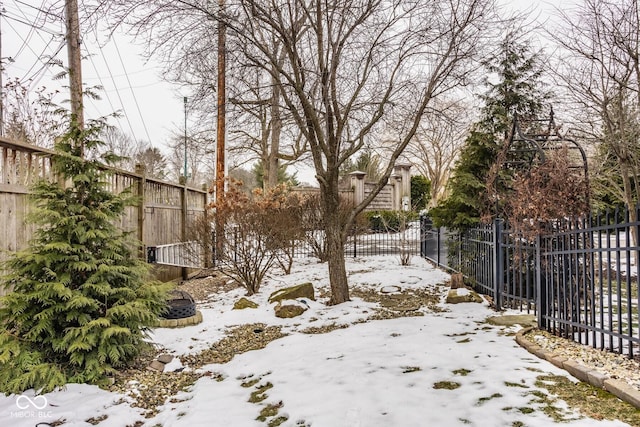 view of yard covered in snow