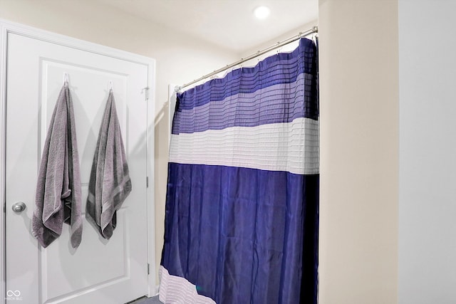 bathroom featuring curtained shower