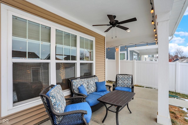 view of patio featuring ceiling fan