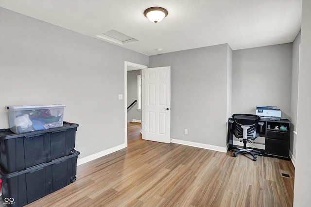 office with hardwood / wood-style floors