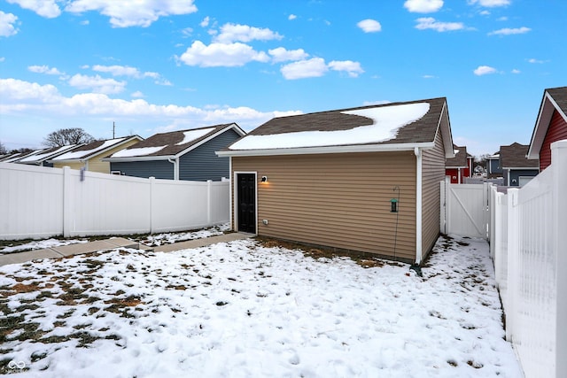 view of snow covered property