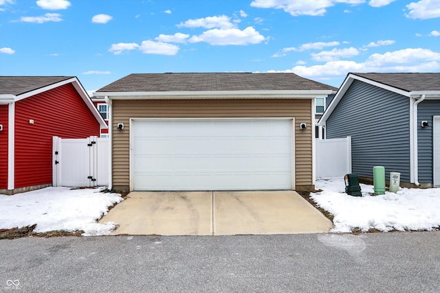 view of snow covered garage