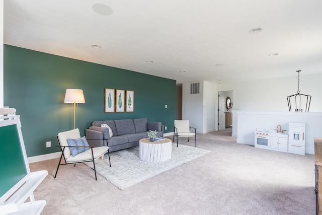 living room featuring light colored carpet