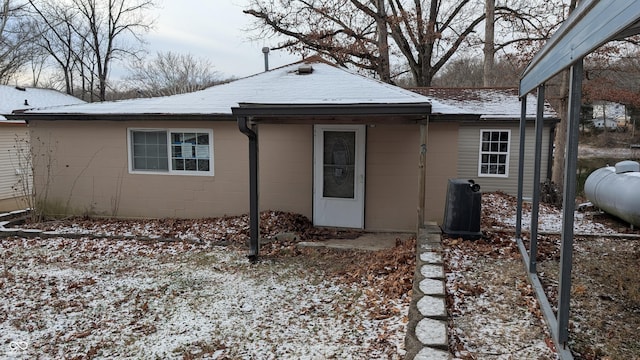 view of snow covered property