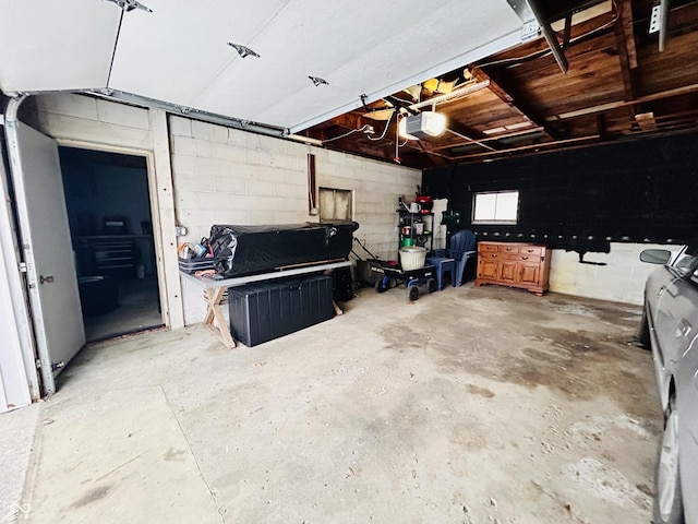 garage featuring a garage door opener