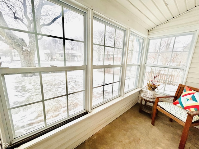 sunroom / solarium with vaulted ceiling