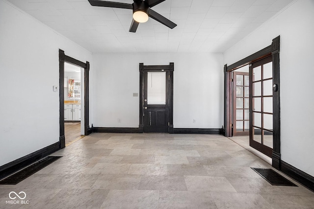 spare room featuring ceiling fan