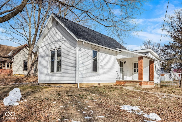 view of home's exterior with a porch