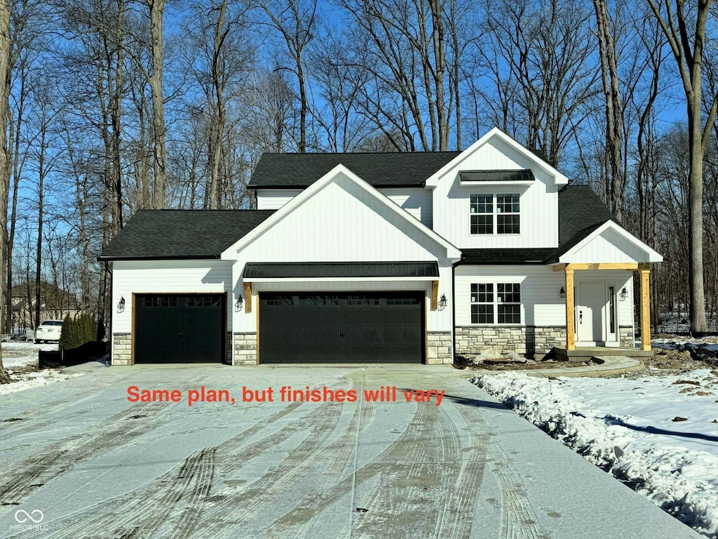 view of front of property with a garage