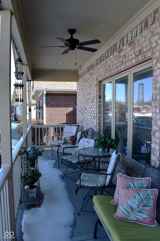 view of patio featuring ceiling fan