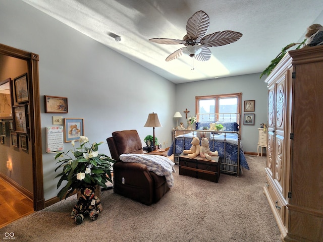 bedroom with ceiling fan and carpet