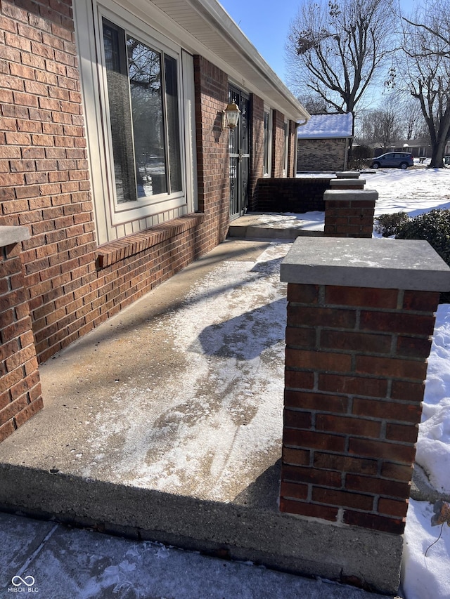 view of snow covered patio