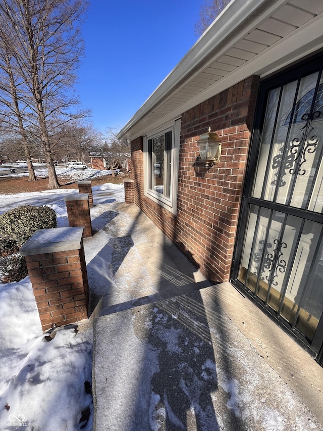 view of snow covered patio