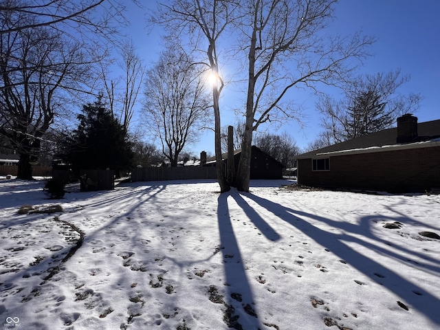 view of snowy yard