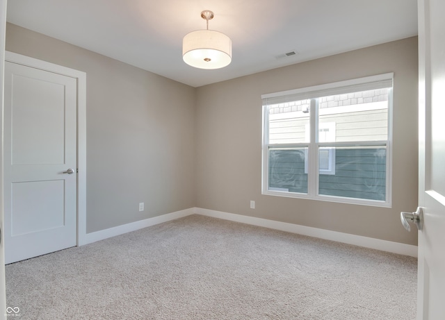 empty room featuring carpet