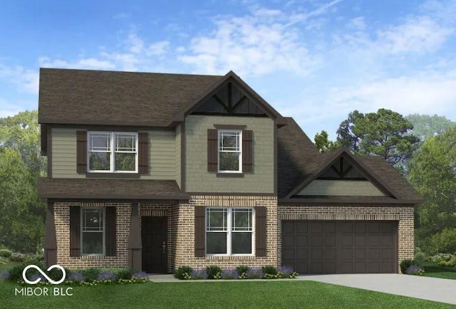 view of front of home with a garage and a front yard