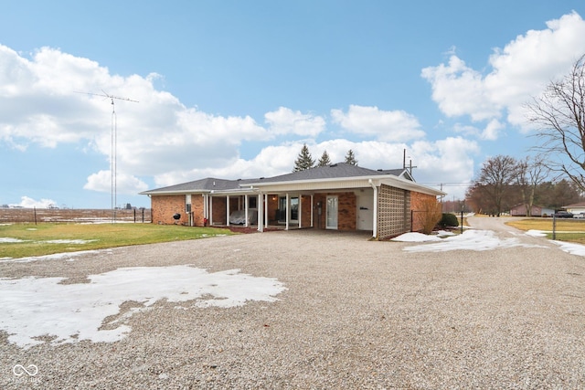 single story home featuring a front yard