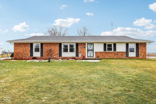 ranch-style home featuring a front yard