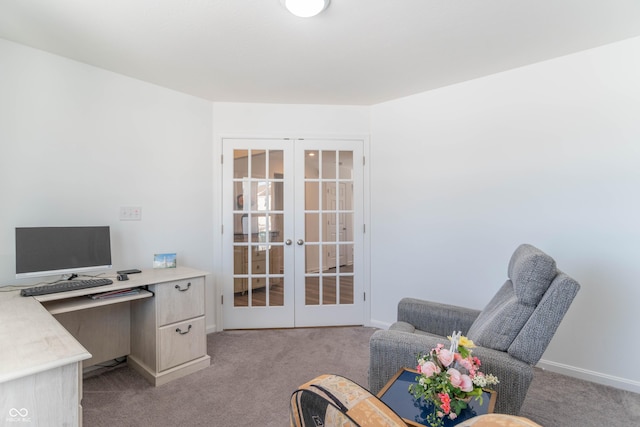 office featuring french doors and light carpet