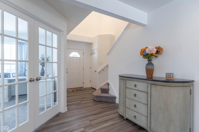 entrance foyer with hardwood / wood-style floors and french doors