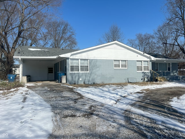 exterior space with a carport