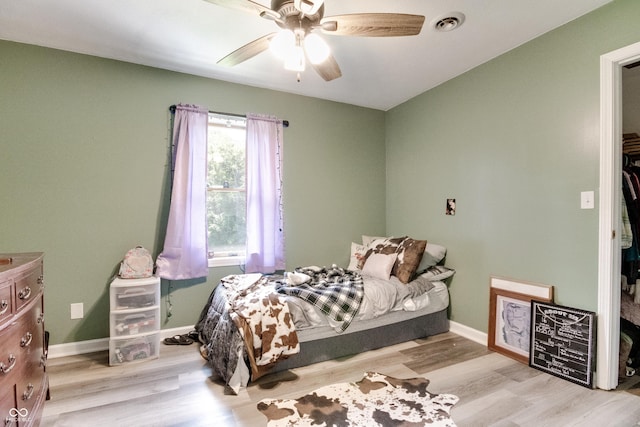 5378 E County Road 600 S, Walton, IN 46994 - bedroom featuring wood finished floors and ceiling fan