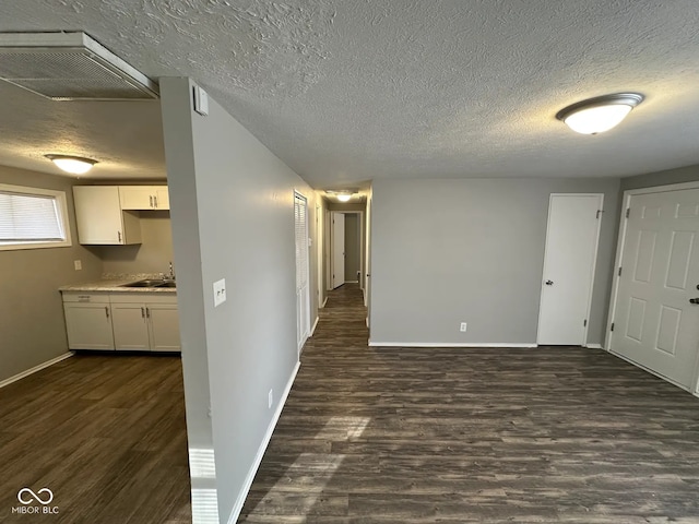 interior space with dark wood-type flooring