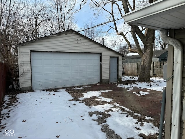 view of snow covered garage