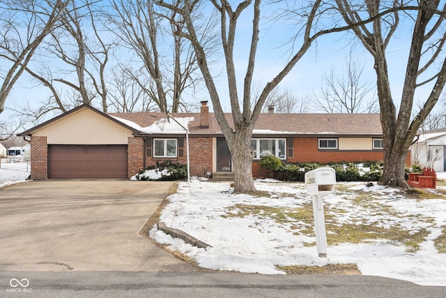 single story home featuring a garage