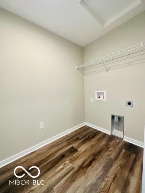 laundry room featuring hookup for a washing machine, dark hardwood / wood-style floors, and hookup for an electric dryer