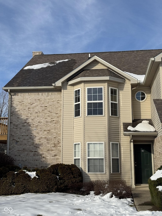 view of snow covered property