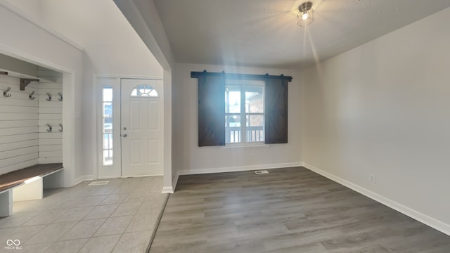 entryway featuring a textured ceiling