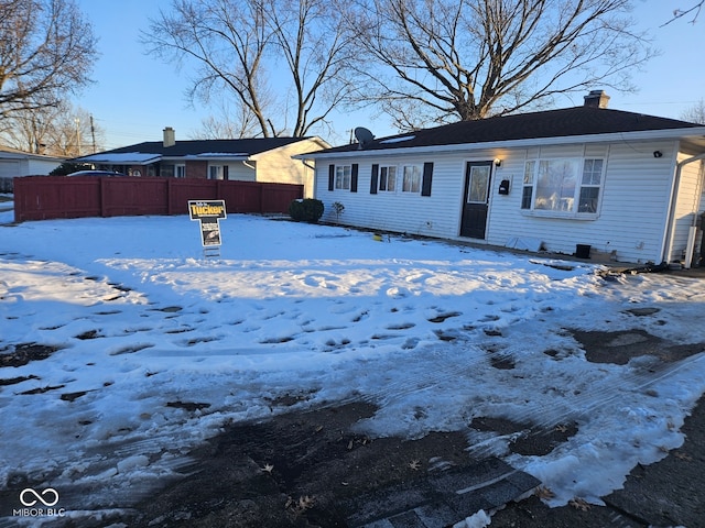 view of snow covered property