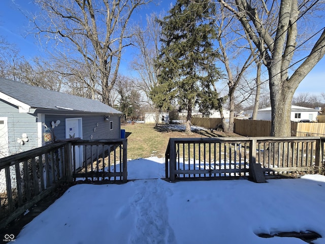 view of snow covered deck