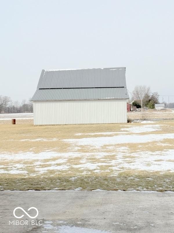 exterior space with an outbuilding