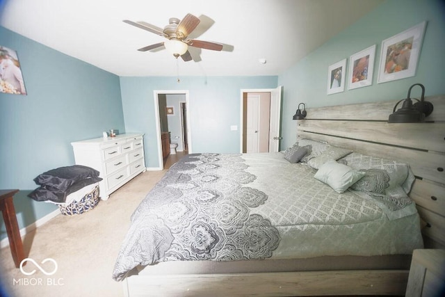 bedroom featuring light carpet and ceiling fan