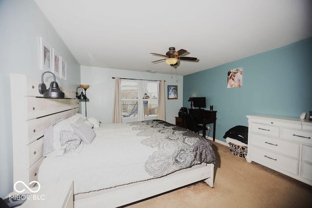 carpeted bedroom featuring ceiling fan