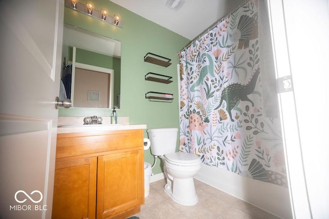 full bathroom featuring tile patterned flooring, vanity, shower / bath combination with curtain, and toilet