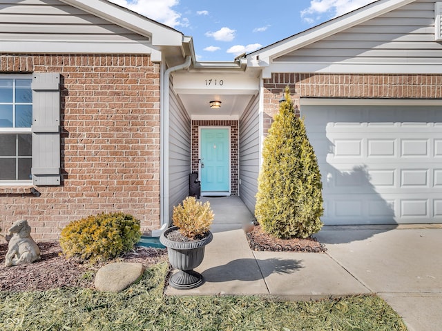 entrance to property with a garage