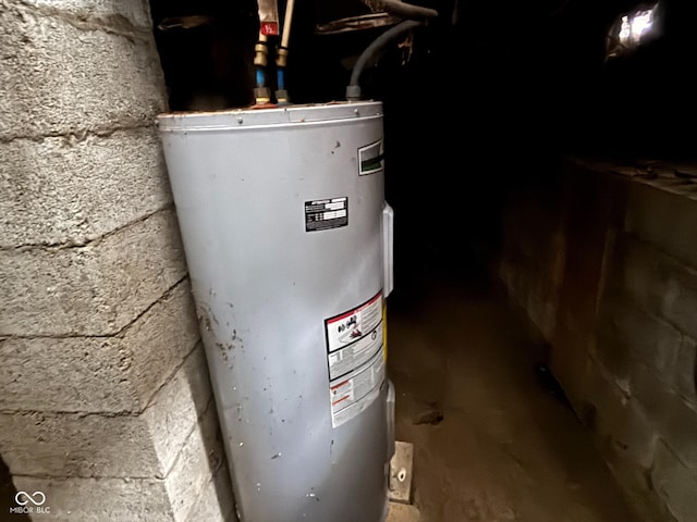 utility room with electric water heater