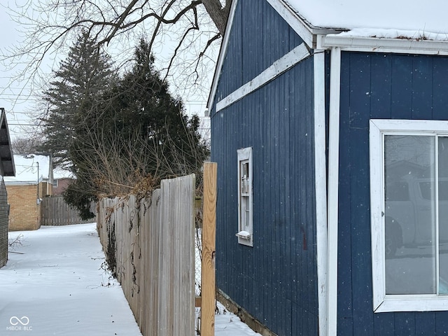 view of snow covered property