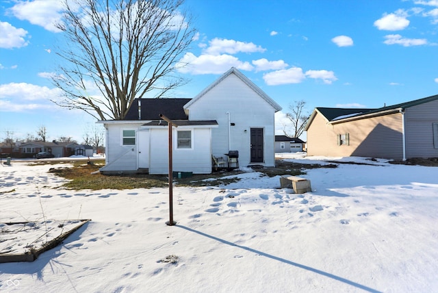 view of snow covered property