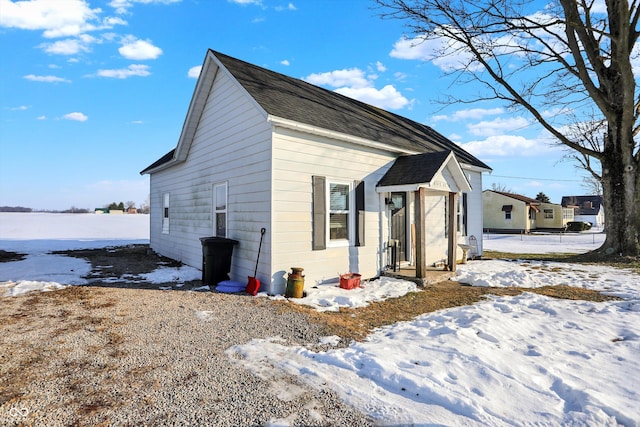 view of snow covered property