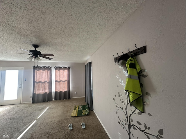 interior space featuring plenty of natural light and ceiling fan