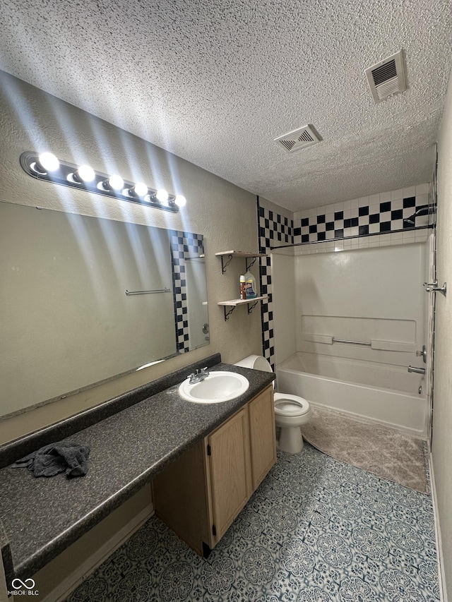 full bathroom with vanity, a textured ceiling, toilet, and washtub / shower combination